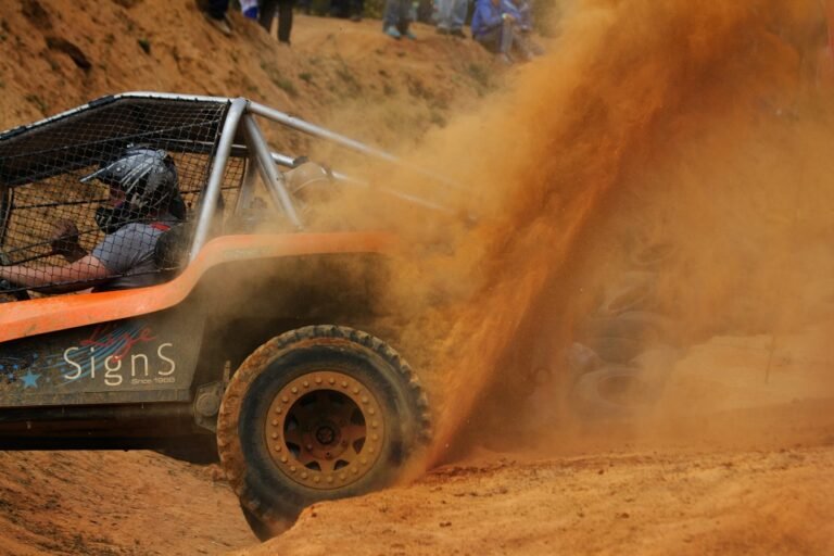 A racing car that is stuck in the mud