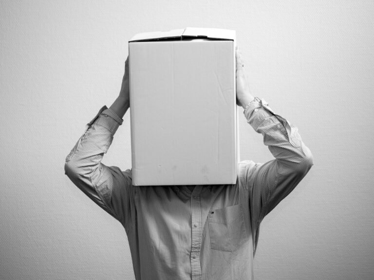 A man wearing a box